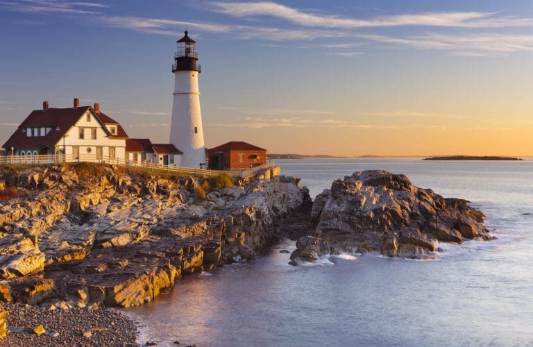 The Portland Head Lighthouse in Maine, USA at sunrise.