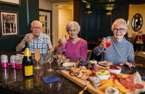 senior living residents enjoy cocktails in burlington ma