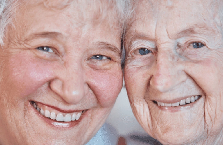 Close up of two senior women smiling