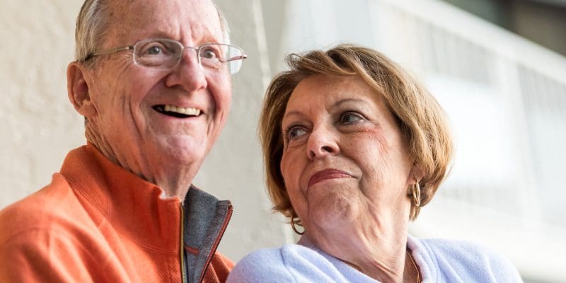 Smiling Senior Couple looking away